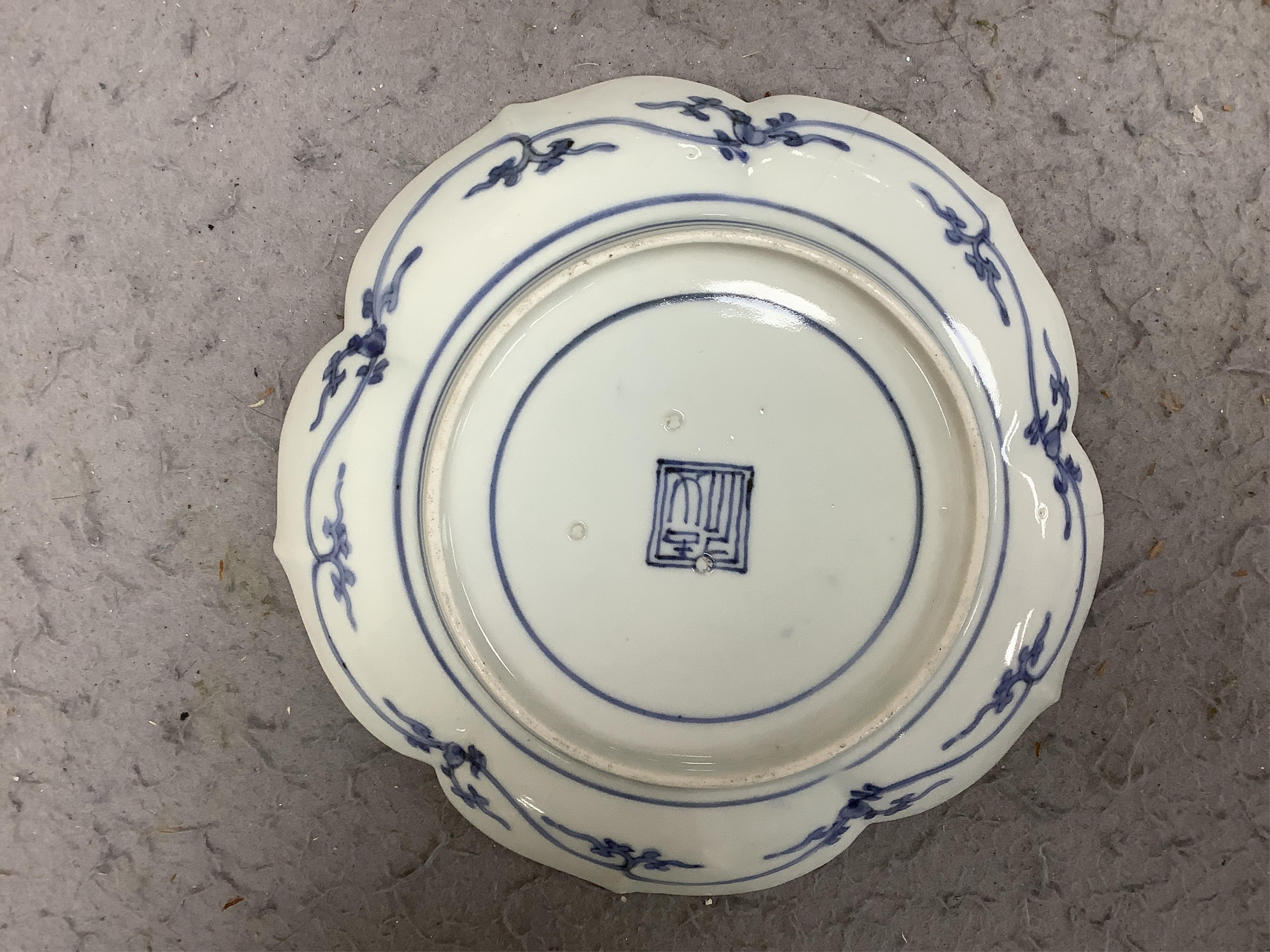 Three Japanese Kakiemon style blue and white dishes and an 18th century Chinese famille rose dish. Condition - varies